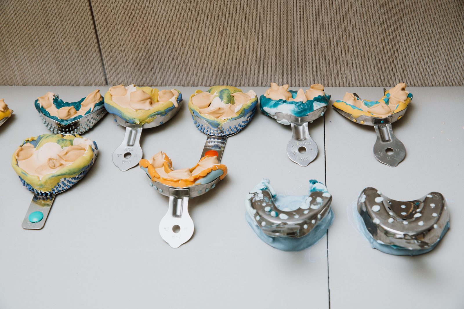 Metal dental impression trays and instruments