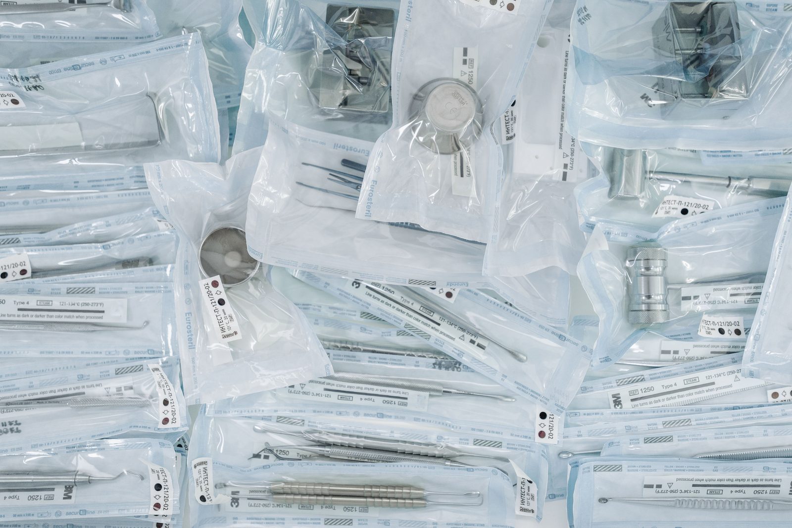 Sterilised dental instruments in sealed pouches