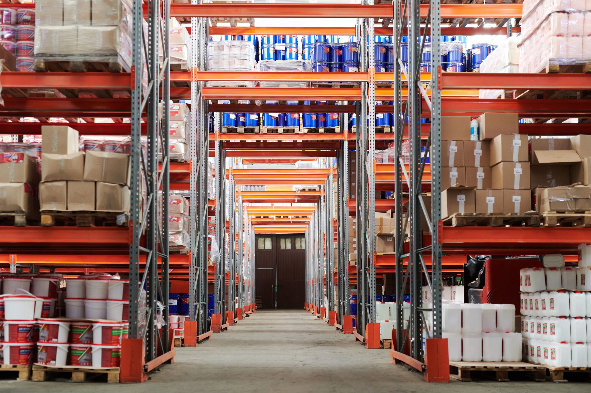 Organised warehouse with racking and palletised stock